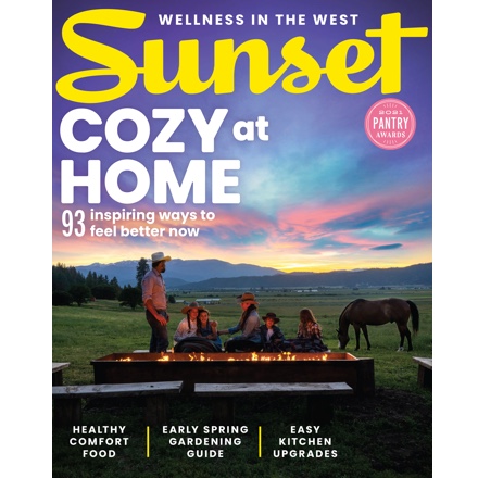 Sunset magazine cover. Group wearing cowboy hats around a small fire.